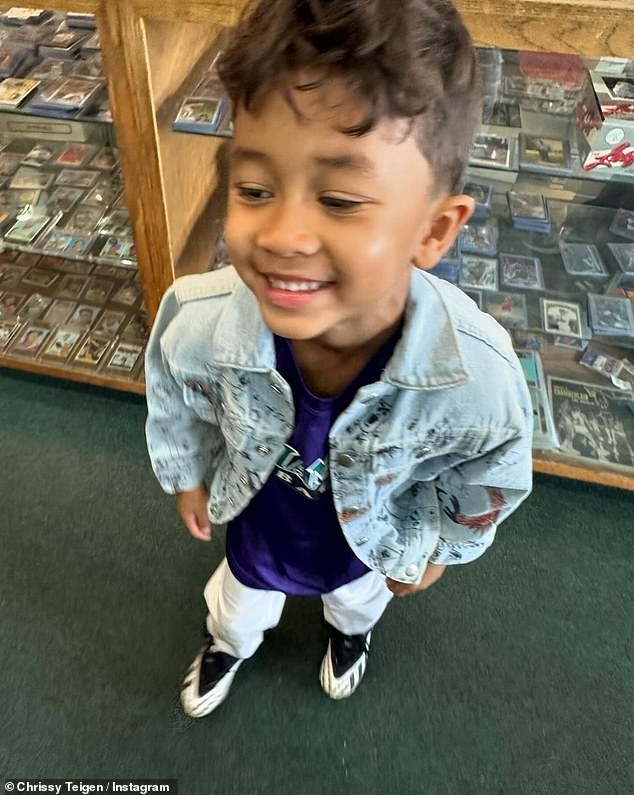 The influencer's latest photos showed her son Miles, five, smiling as he stood in the middle of a vintage video game store
