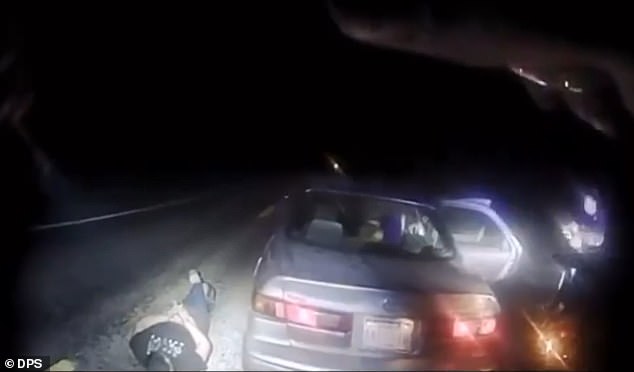 The driver and his passenger were caught by police and forced to lie on the ground