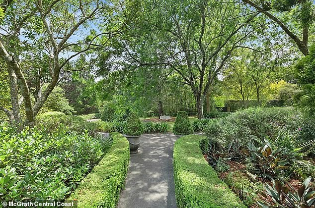 Other amenities include a classic porch, vegetable garden and fire pit