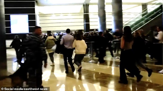 Footage from the concert venue showed panicked attendees running for their lives in the foyer of Crocus City Hall