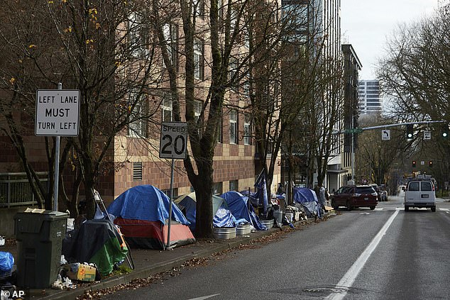 Tents line the sidewalk of SW Clay Street in Portland as 5,398 people sleep in the city