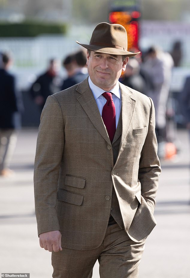 Peter Phillips, 46, (pictured in March at the Cheltenham festival) said the King is 'hugely frustrated' that he cannot go out and do everything he wants to do.