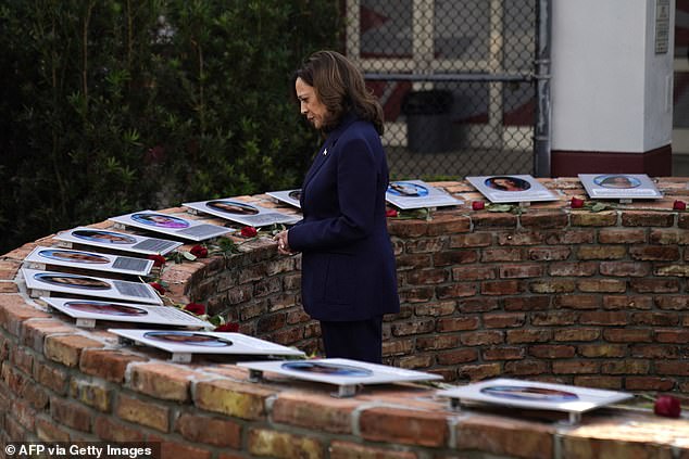 Harris toured the pristine classrooms and visited a memorial to the victims