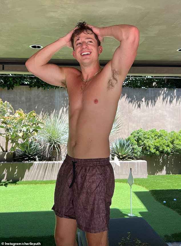 Singer-songwriter and Grammy nominee Charlie Puth poses near a golf green in August 2022