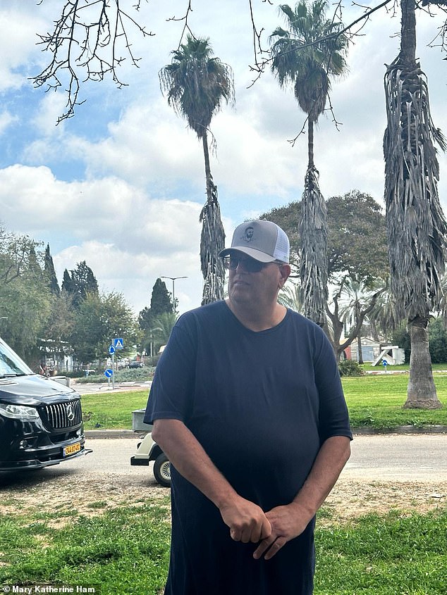 Shachar (above) and Ayelet Kohn are the only people who have returned to Kfar Aza, near the Gaza border.