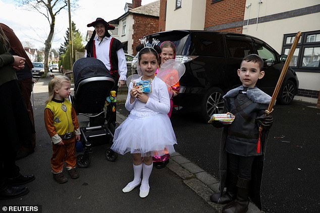 Jewish children, dressed up in costume, celebrate the annual holiday of Purim in Manchester today