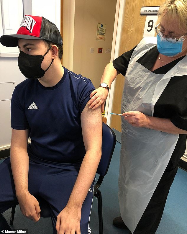 Mason was diagnosed with Crohn's disease in 2017, meaning he is at much greater risk of serious illness if he contracts Covid-19.  The 22-year-old is pictured receiving one of the AstraZeneca jabs