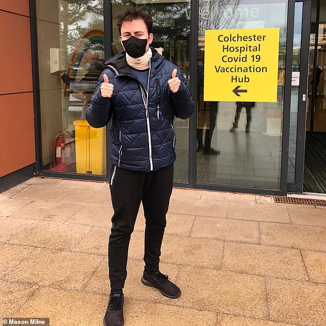 Mason, pictured outside the Covid vaccination center at Colchester Hospital, takes chemotherapy tablets daily and biologic injections every fortnight as part of his treatment for Chron's disease