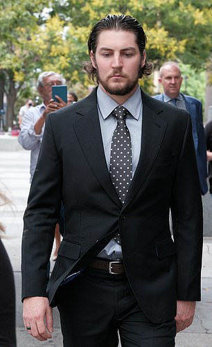 Trevor Bauer leaves the courthouse after the final day of hearings on August 19, 2021