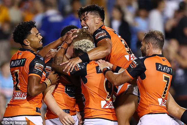 Wests Tigers have claimed the last two consecutive NRL wooden spoons and were in full celebration mode after Saturday night's breakthrough win