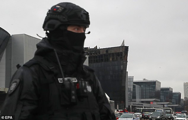 A security staff stands outside the Crocus City Hall concert venue