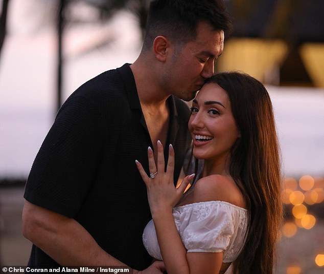 Milne showed off the huge square engagement ring in a photo after saying yes and sharing a kiss with her husband-to-be