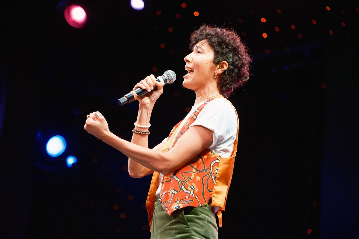 Vico Ortiz performs a song during Celebrity Karaoke on the 2024 JoCo Cruise