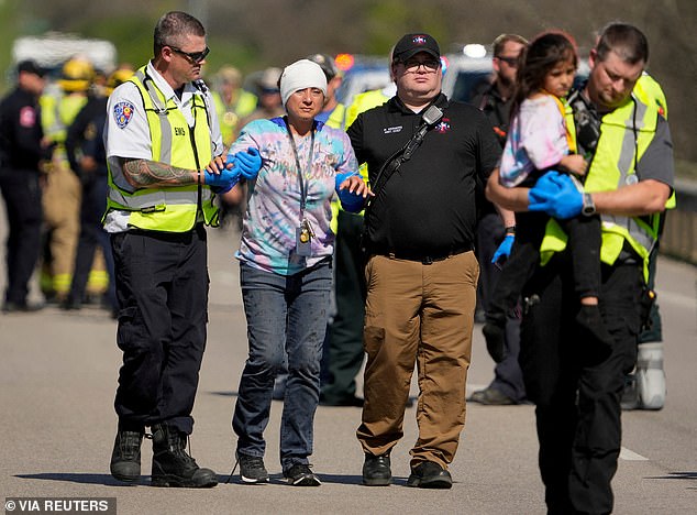 People are transported after a fatal school bus crash near Austin - the class of kindergarteners was returning from a visit to the zoo