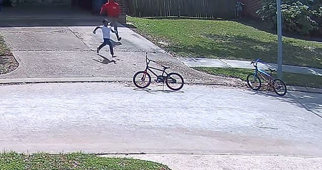 Seconds later, the boys ran out of the garage, jumped on their bikes and paddled away