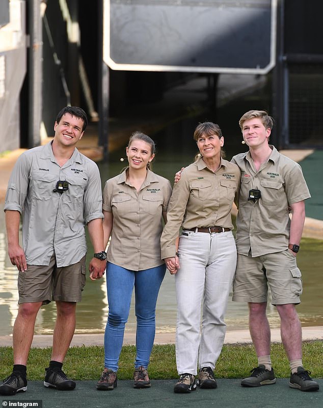 Copies of the footage of Steve's death were released to Queensland authorities at the time to assist in their investigation, but they were all destroyed in 2007. The sole surviving copy was given to Terri, who burned it without viewing the footage.  Pictured from left to right: Chandler Powell, Bindi Irwin, Terri Irwin, Robert Irwin