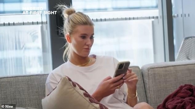 Tensions came to a head during Monday night's episode of Married At First Sight when Lauren Dunn (left) finally confronted husband Jonathan McCullough (right) about texting fellow bride Ellie Dix