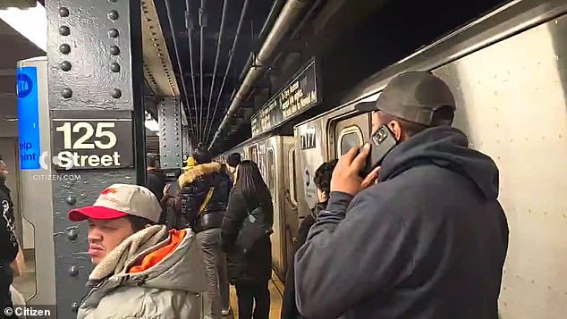 Five trains were seriously delayed in both directions on Monday evening after a man was pushed onto the track in front of an oncoming train