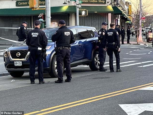 Neighbors heard shots ring out at 5:50 p.m., less than two blocks from the NYPD's 101st Precinct station, before seeing the fatally wounded officer lying in the street