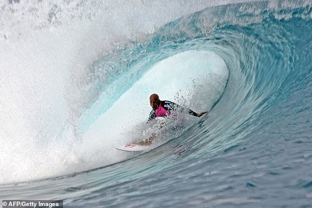 Slater also uses a dead man's body part to hold his hip together (photo, competing at the Billabong Pro in Tahiti)