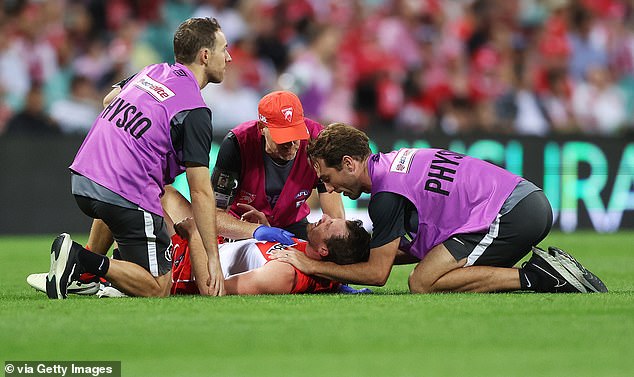 Swans star Cunningham suffered a concussion and received help from the field after the collision early in the first quarter