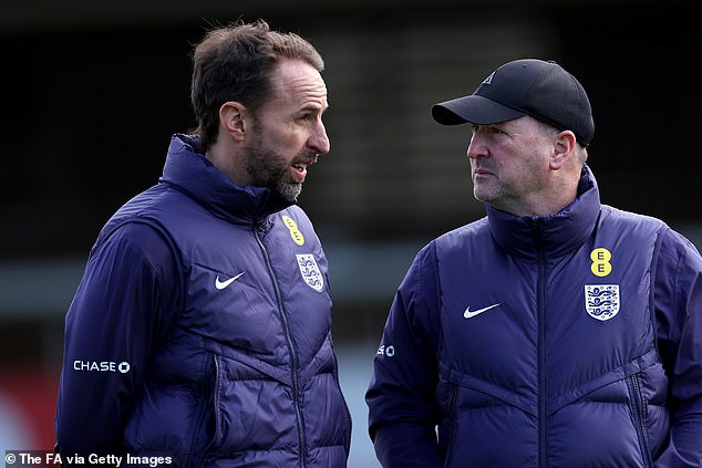 Reports suggested he left the World Cup camp after falling out with Steve Holland (right), although Gareth Southgate (left) insisted there are no issues between the pair
