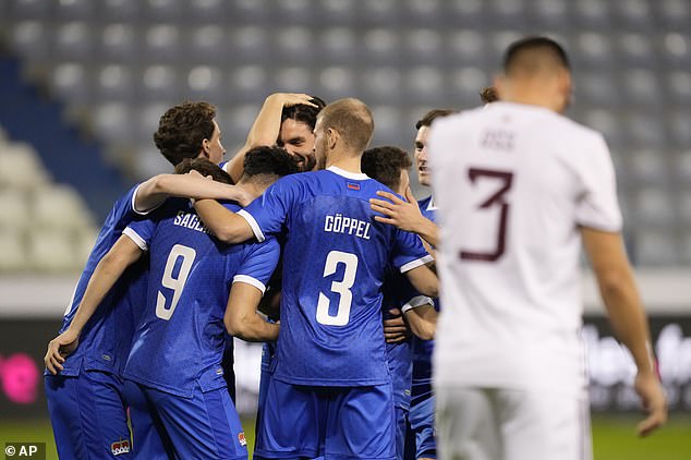 The Liechtenstein players celebrated as they took the lead almost immediately after kick-off