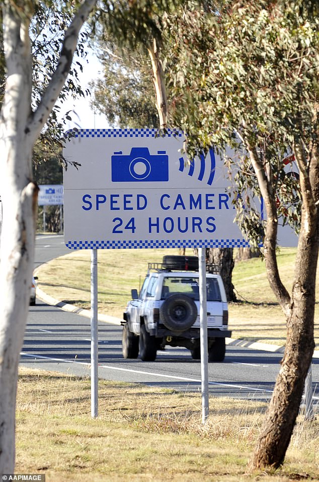 Devices built into vehicles designed to avoid speed cameras will also earn double points (pictured a mobile speed camera sign)