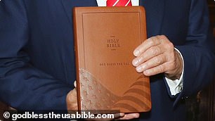 It contains the words 'Holy Bible' and 'God Bless the USA'