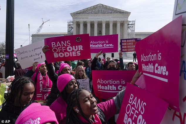 Pro-abortion rights protesters gathered outside the Supreme Court with signs and chants.  They warned that the case would impact abortion access not only in states that have banned abortion, but for all 50 states, including those that have expanded access.