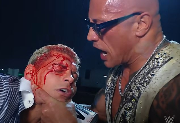 He was involved in a bloody brawl with Cody Rhodes (left) to close Monday's RAW show