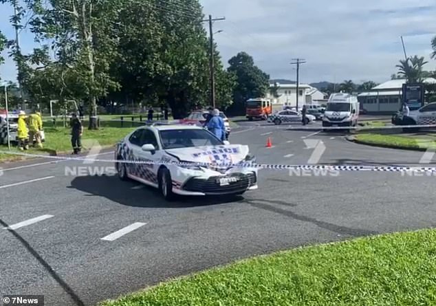 Police shot the man after he crashed the suspected stolen police car outside IGA in Woree, Cairns (pictured)