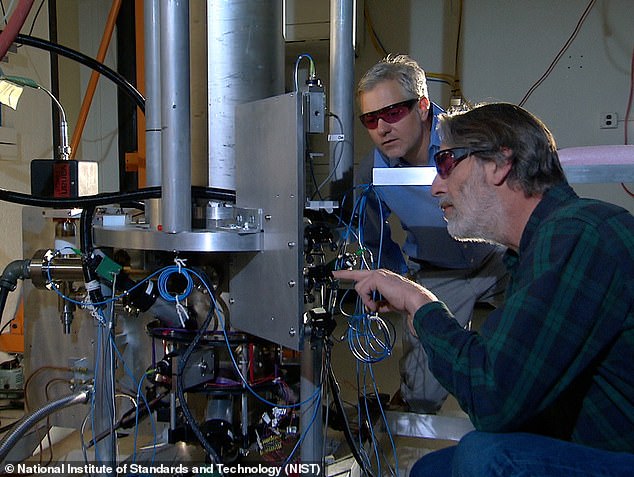 Coordinated Universal Time (UTC) is defined by advanced, ultra-precise 'atomic clocks' around the world, ticking accurately and continuously.  Experts pictured here with the NIST-F2 atomic clock in the US