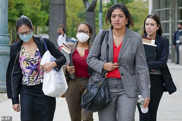 The federal agents are basing their case on the case filed by Shihata (second from right) against disgraced rapper R Kelly.  In the photo: Shihata and her team leave the trial in 2021