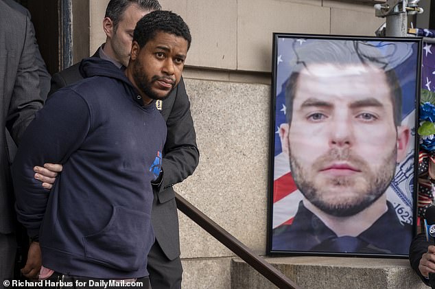 Jones was seen walking past Diller's photo as he left the 101 precinct on Wednesday