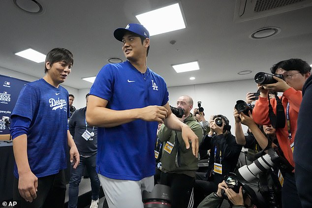 Shohei Ohtani and Ippei Mizuhara leave a press conference in Seoul last week