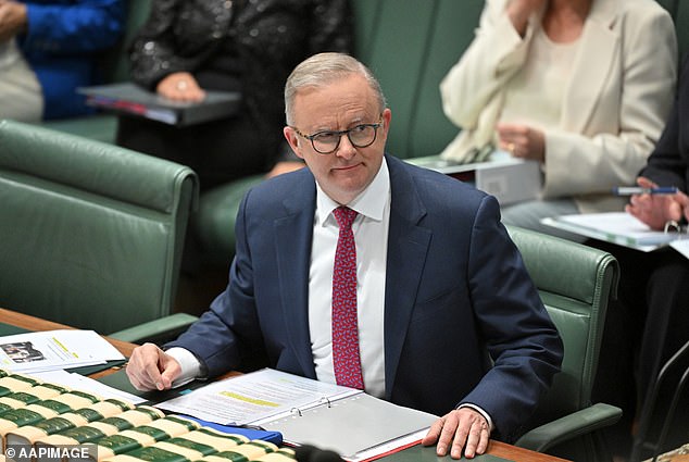 The Prime Minister said his job description does not fall under the control of the Australian Football League