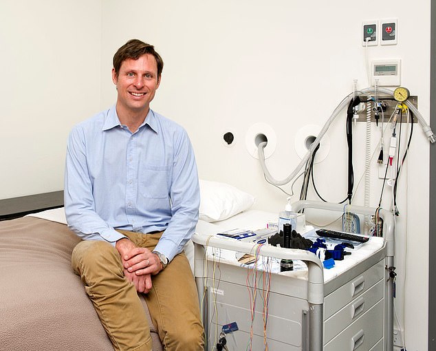 Professor Danny Eckert (pictured) and his 12-year-old son were found with non-life-threatening injuries after clinging to a reef off Spilsby Island for around 10 hours