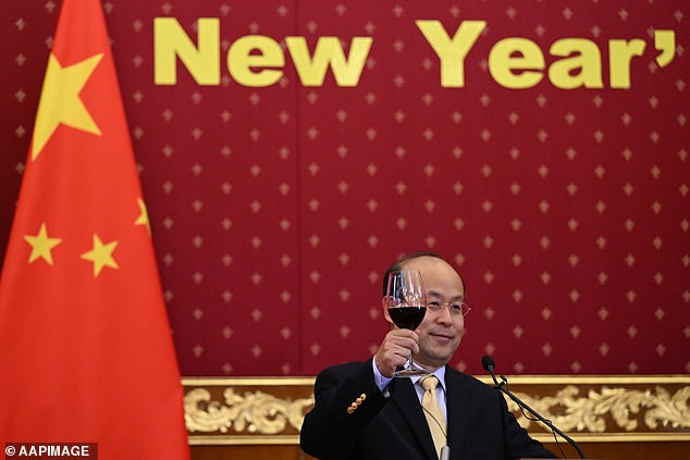 Chinese Ambassador to Australia Xiao Qian raises a glass