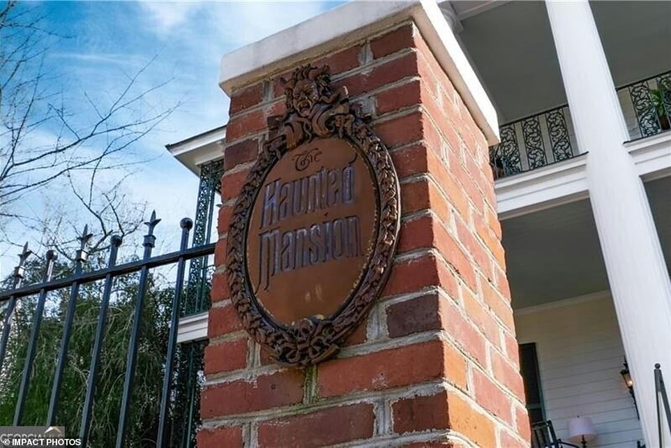 The second floor balcony features an 'elaborate cast iron forged in a foundry just for Disney'