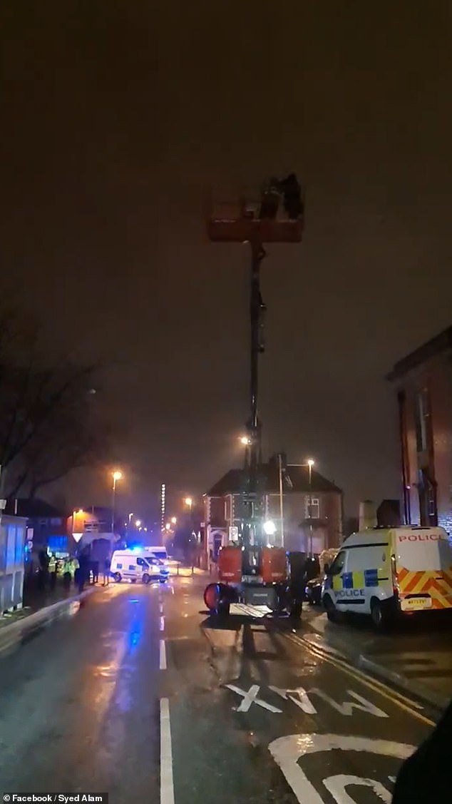 The red construction vehicle was driven outside Chadderton Town Hall