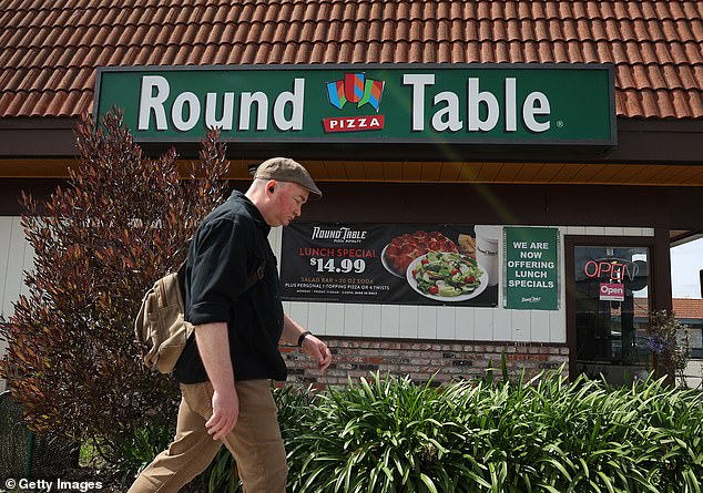 Round Table Pizza, a chain with about 400 locations, says it will lay off about 1,280 delivery workers this year