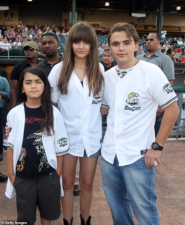 Prince is pictured with his siblings in August 2012