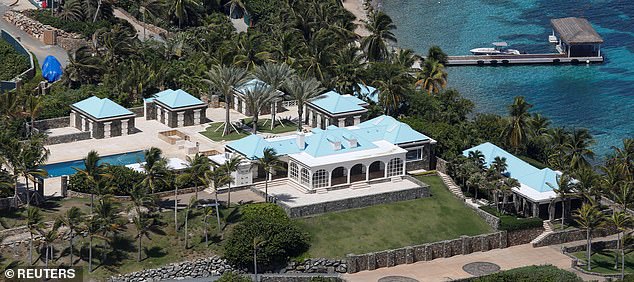 The sprawling estate Epstein had built on Little St James, with surrounding lawns and a swimming pool.  In the background, a jetty extends into the clear, blue water