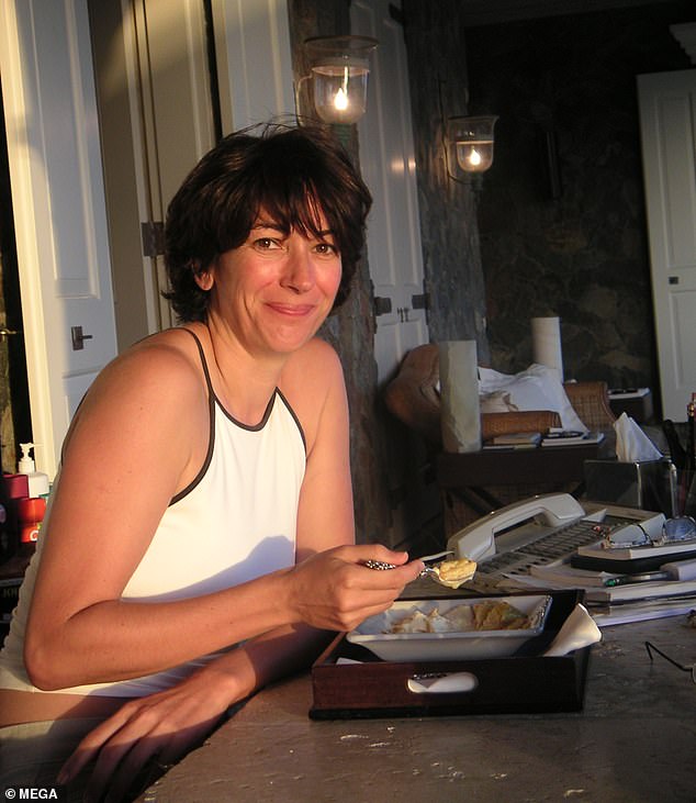 Ghislaine Maxwell is pictured in this undated photo having dinner at Epstein's mansion on Little St James Island