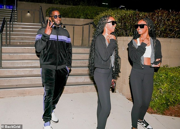 On Thursday night, Diddy broke cover when he took his twin daughters to a golf club in Miami.  He flashed a peace sign as his daughters smiled at each other