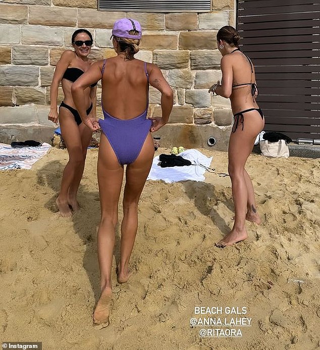 Pip, 43, meanwhile, was chic in a purple swimsuit with a high-cut design and stayed safe in the sun with a cap.  The friends hung out for fun photos with friend Anna Lahey, the founder of Vida Glow supplements