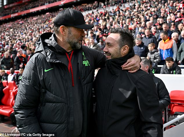 Jürgen Klopp embraces a man who will succeed him next season in Roberto De Zerbi