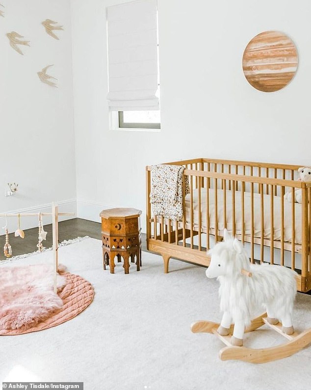 Before the starry makeover, the bedroom had white walls and a cozy crib