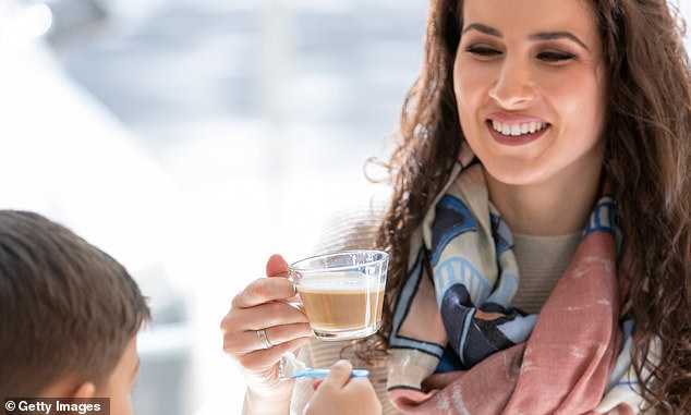 A mother and her three-year-old autistic son went to a store to buy hot chocolate.  (Image: a stock photo of a child with his mother)